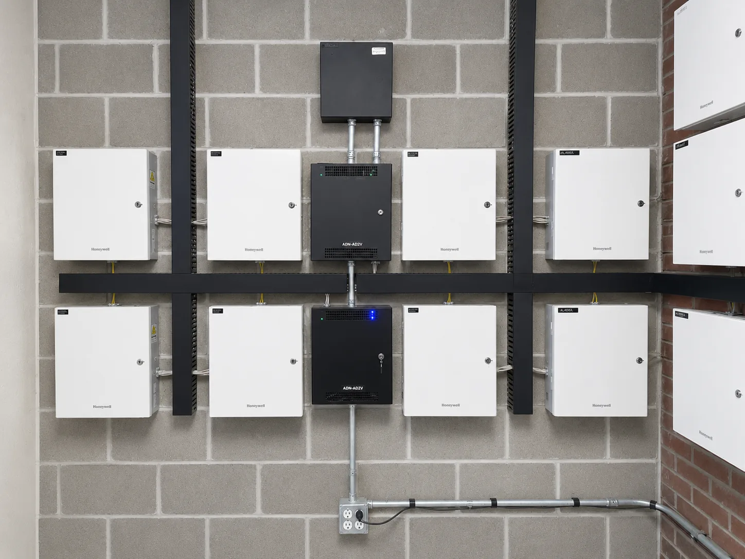 Organized access-control head-end equipment and conduit at a large industrial facility in Bloomington Illinois