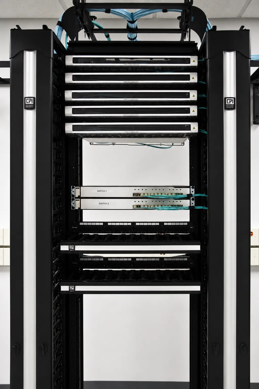 New network equipment rack with overhead cable routing and organized cable management at an industrial plant in Morton Illinois